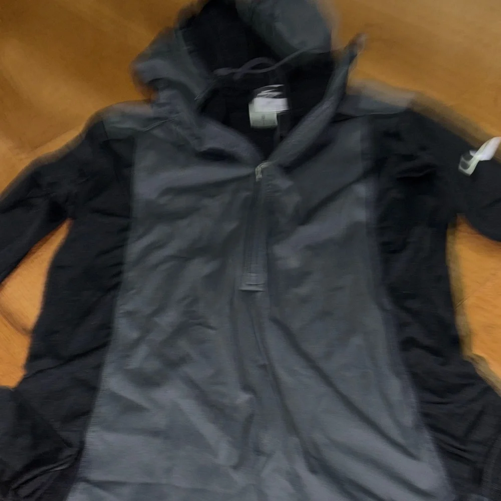 Nike Pro Dri-Fit pull over. Great for running this winter size large
